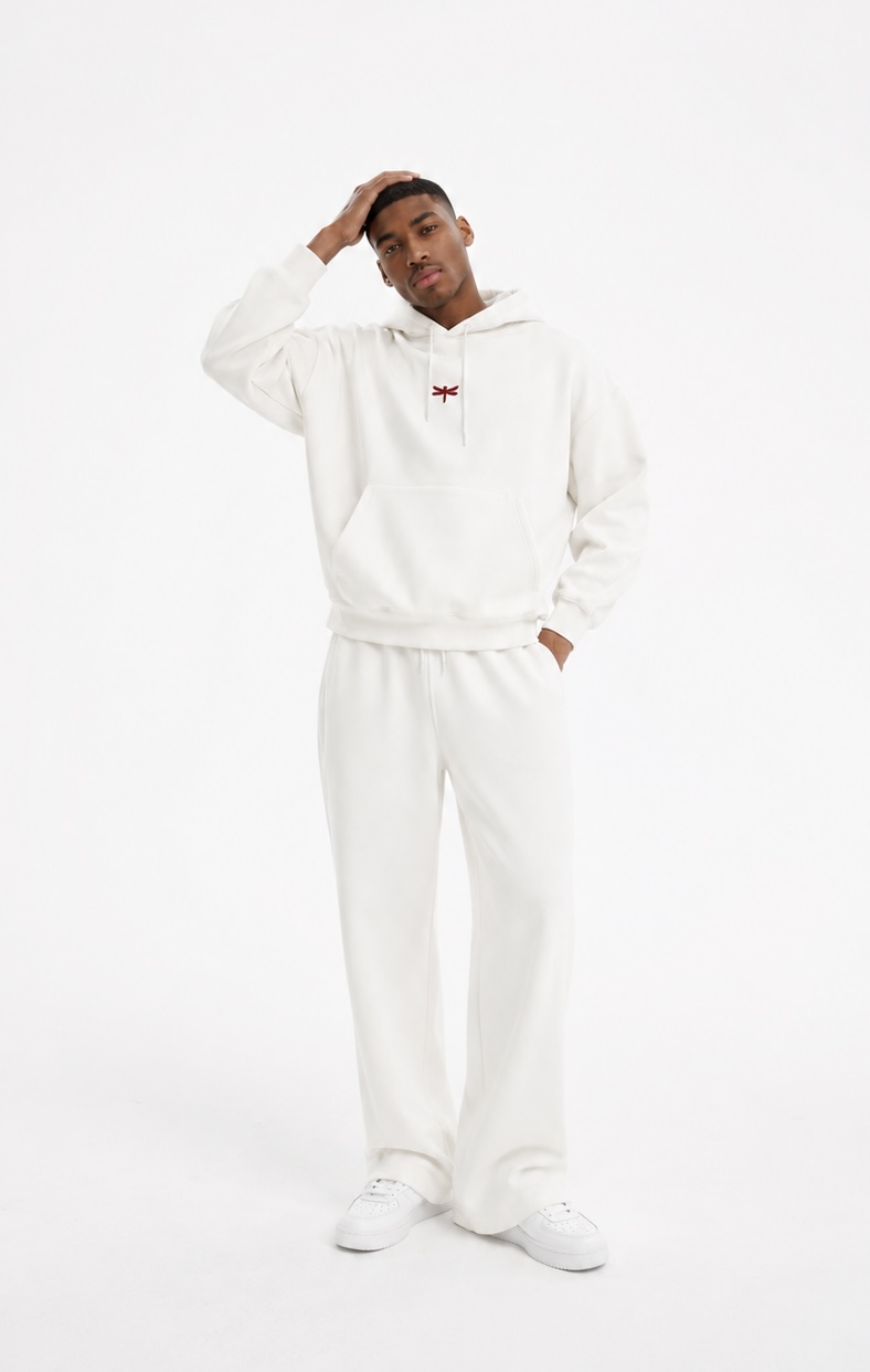 Man wearing the white hoodie and matching pants