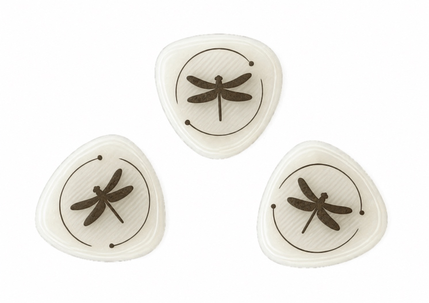 Three Lumen antioxidant discs with Red Dragon Fly emblems