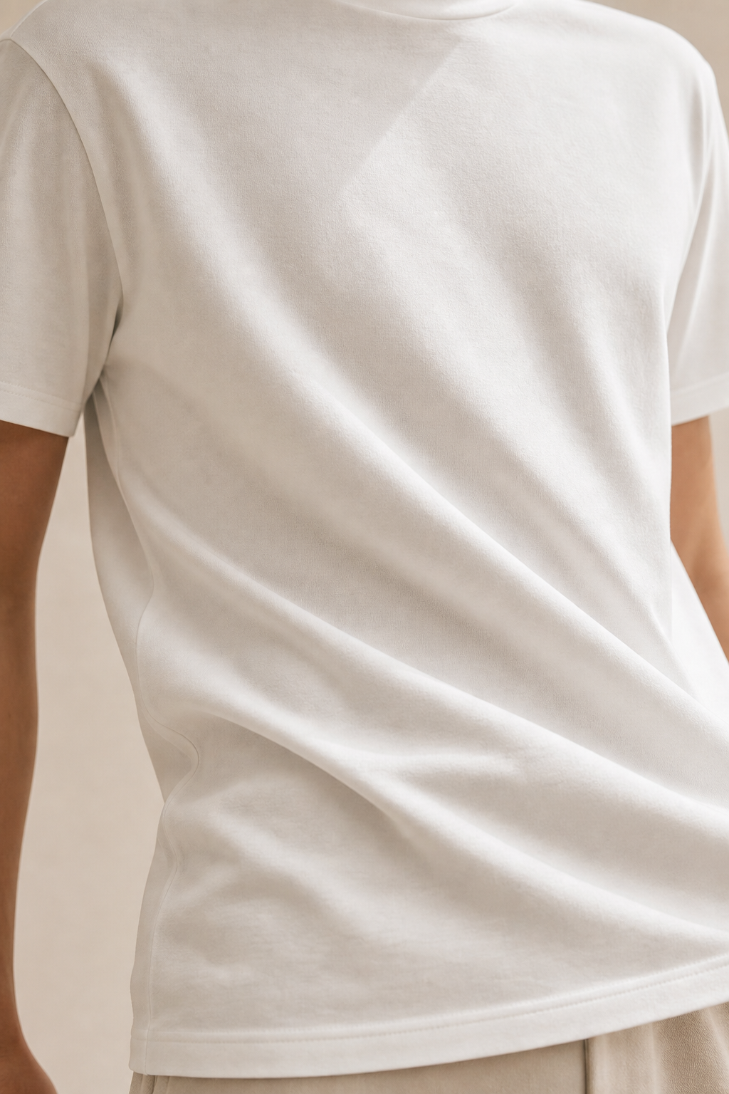 White organic cotton tee fabric moving softly