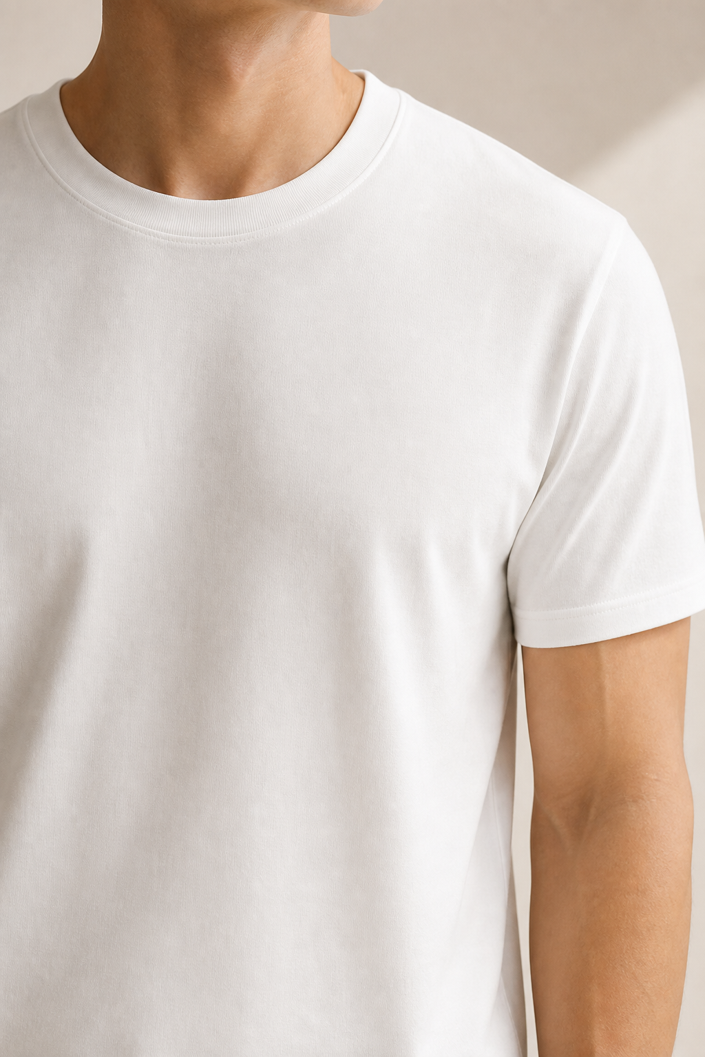 White regulation tee showing clean front fit